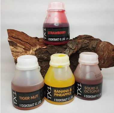 SHIMANO BAIT TX1 HOOKBAIT GLUG BANANA & PINEAPPLE DIP 200 ML - Carpfishingbarato CHIMBOMBO LIQUIDO