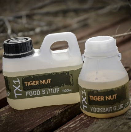 SHIMANO BAIT TX1 FOOD SYRUP TIGER NUT ATTRACTANT 500 ML - Carpfishingbarato CHIMBOMBO LIQUIDO